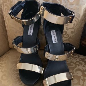Steve madden leather & metal Wedge shoes.